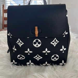 Beautiful embroidered backpacks in leather comes with Wallet